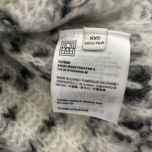 Oversize, black and white Toteme mohair sweater